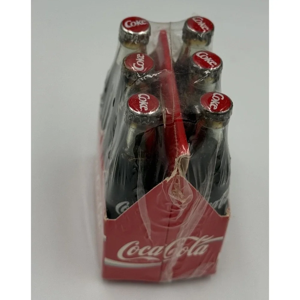Vintage Miniature Six Pack of Glass Coca Cola Bottles In Paper Carrier Sealed